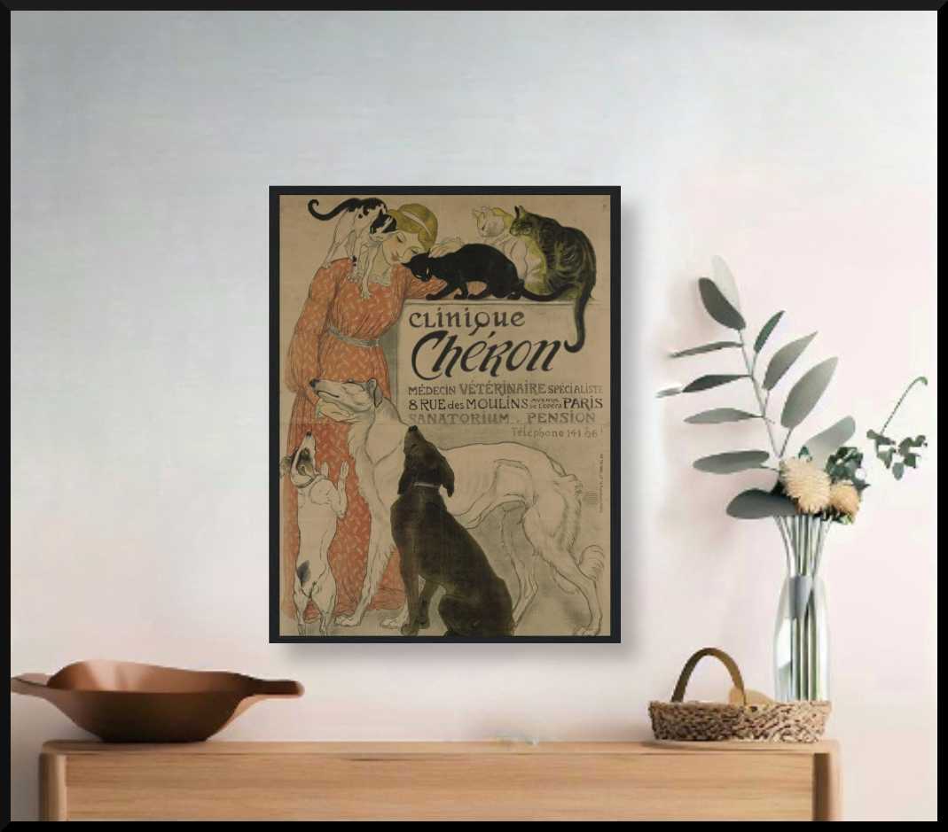 Black wooden framed poster - a matte art print vintage advertising illustration depicting a girl in a long orange vintage dress surrounded by a few cats on a dark cream background - ready to hang - matte acid free paper. Pictured on a wall above a wooden entry hall table. a bowl sitas to the left of the table and an arrangement of flowers to the right