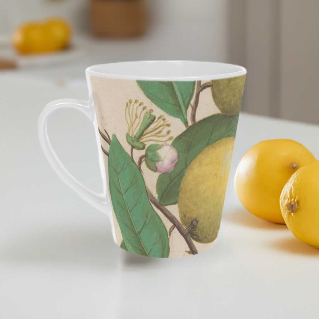 'Lemon Tree' Latte Mug, 12oz Scratch resistant white ceramic with c shaped handle - Free Shipping in Canada.  Pictured on a white kitchen counter with lemons on it